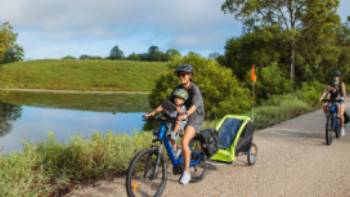 Family cycling the Northern Rivers Rail Trail