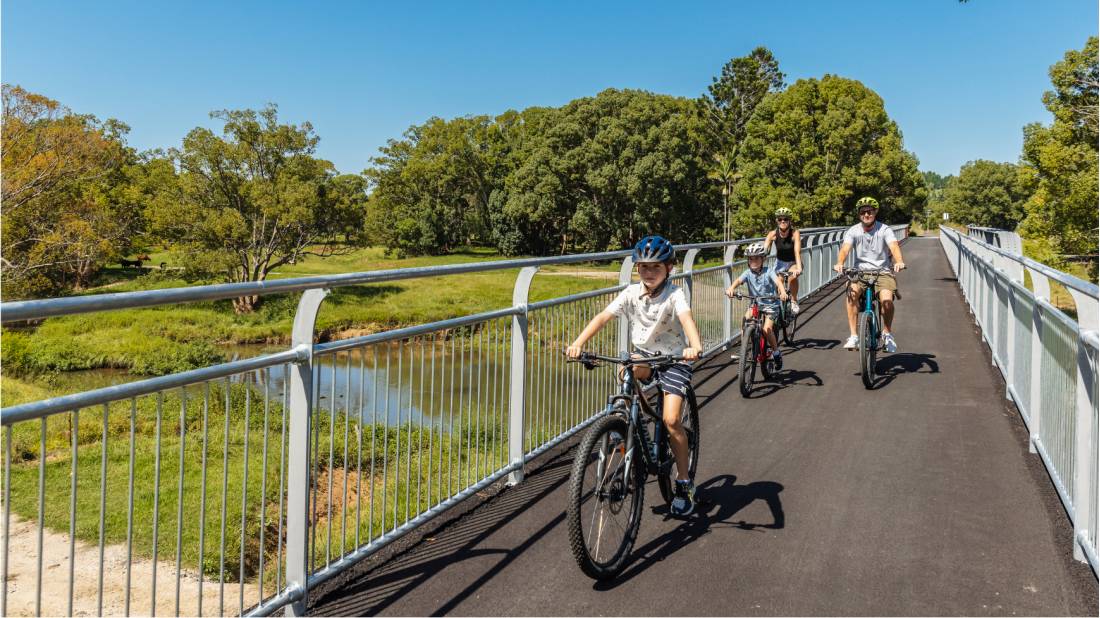 Family cycling the Northern Rivers Rail Trail