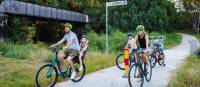 Family cycling the Northern Rivers Rail Trail