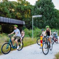 Family cycling the Northern Rivers Rail Trail