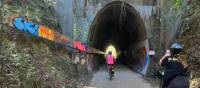 Cyclist entering tunnel on the northern rivers rail trail | Kate Baker