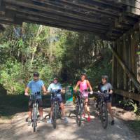 Cyclists at the end of the first stage of the Rail trail at Crabbes Creek | Kate Baker