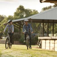 Riding past Yea Station on the Great Victorian Rail Trail | Ride High Country